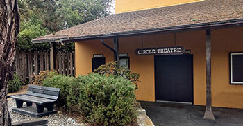 Street view of the Circle Theatre on Casanova Street between 8th and 9th Avenues